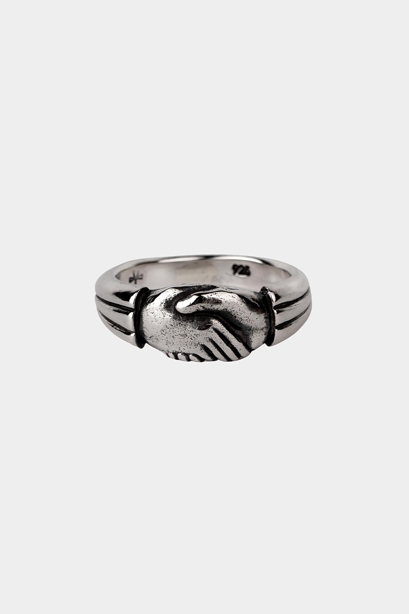 clasping hands ring